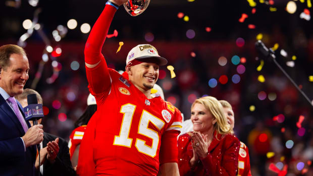 Feb 11, 2024; Paradise, Nevada, USA; Kansas City Chiefs quarterback Patrick Mahomes (15) celebrates with the Vince Lombardi Trophy after defeating the San Francisco 49ers in overtime of Super Bowl LVIII at Allegiant Stadium. Mandatory Credit: Mark J. Rebilas-USA TODAY Sports